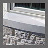 Designer Stone limestone sill.